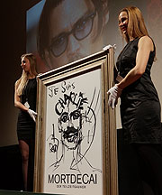 Mortdecai Film-Preview und Benefizauktion: 8.500€ erbrachte das Bild von Johnny Depp (©Foto: Martin Schmitz)
